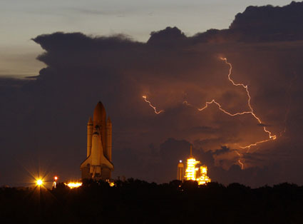 STS-128- Space Shuttle at pad with lightning.